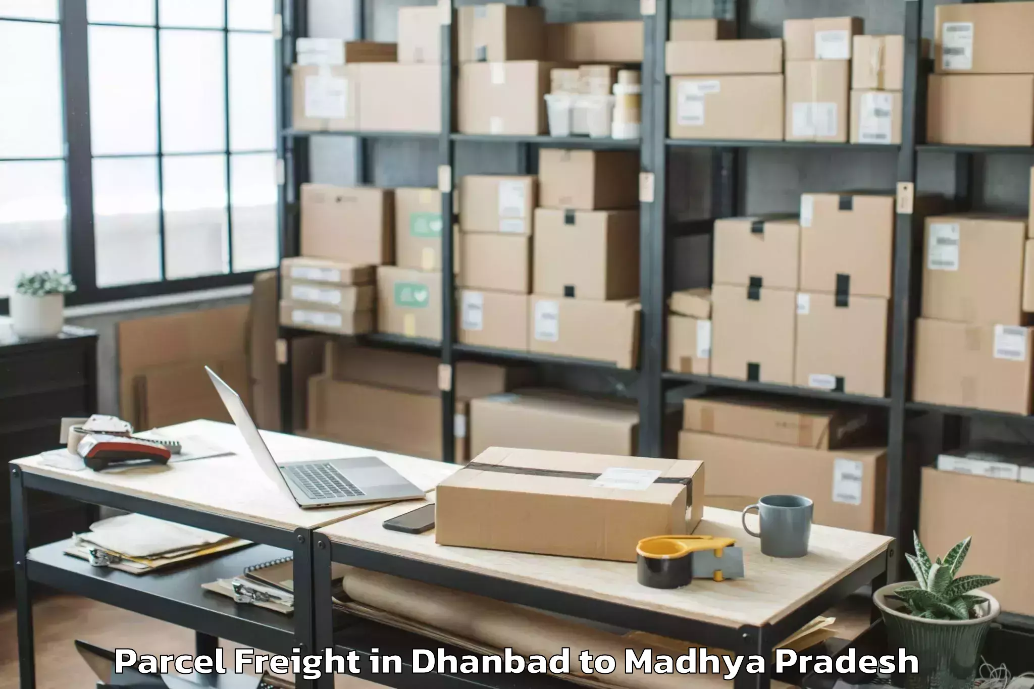 Book Your Dhanbad to Gandhwani Parcel Freight Today